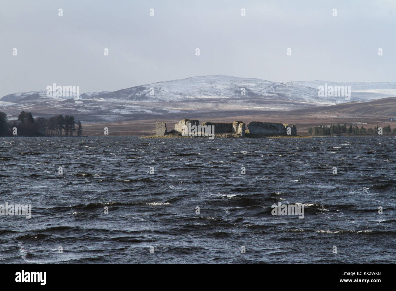 A winter landscape view of Lochindorb Castle in Scotland, UK Stock