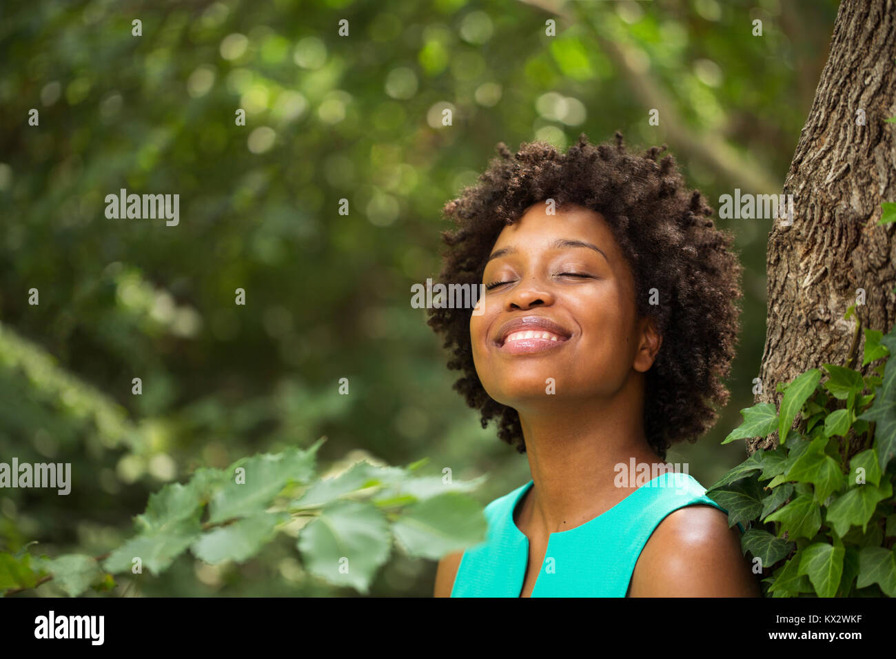 Young happy African American woman smiling Stock Photo - Alamy