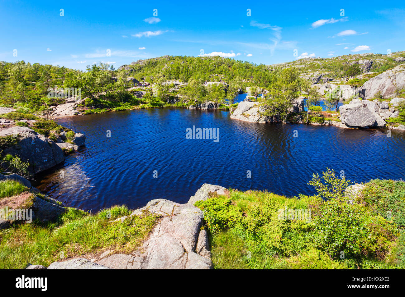 Lake near Preikestolen, Norway. Preikestolen  or Pulpit Rock is a steep cliff which rises above the Lysefjord. Stock Photo