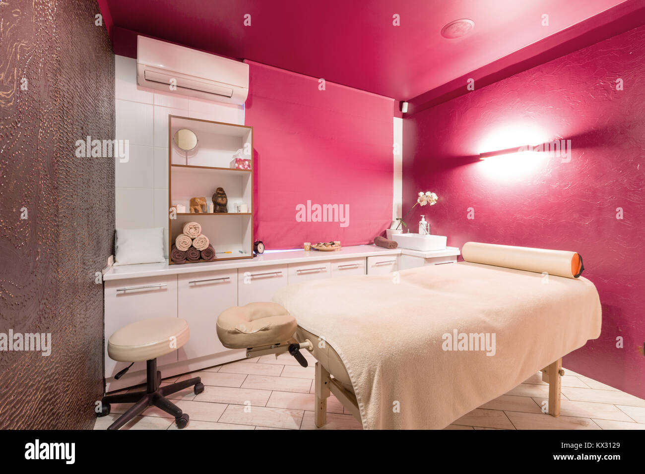 Massage room interior design in wellness and spa center. Dim lighting Stock  Photo - Alamy
