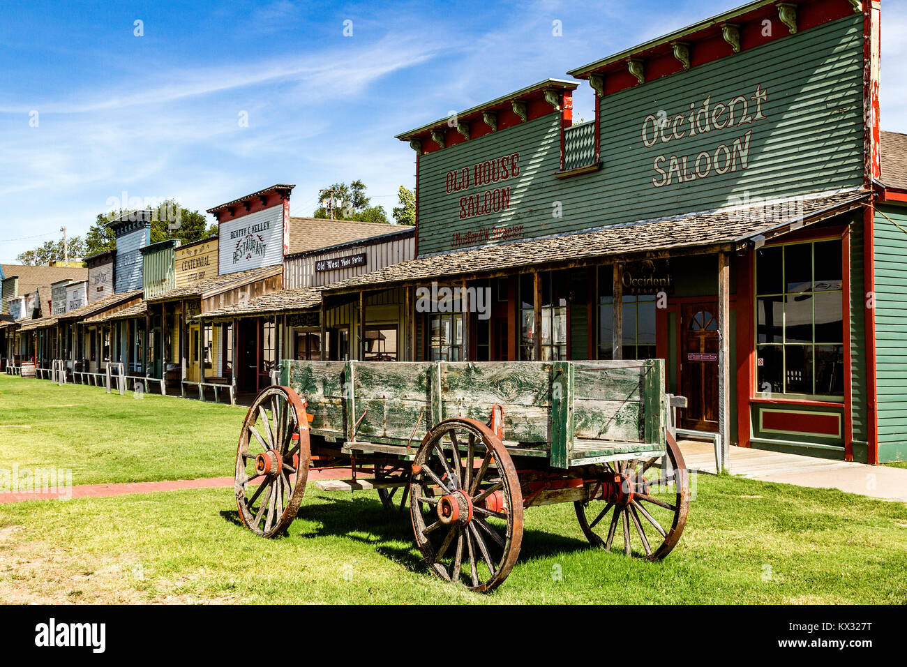 Couple outside Long Branch saloon in Dodge City, Kansas. Building is part  of Boot Hill Museum Stock Photo - Alamy