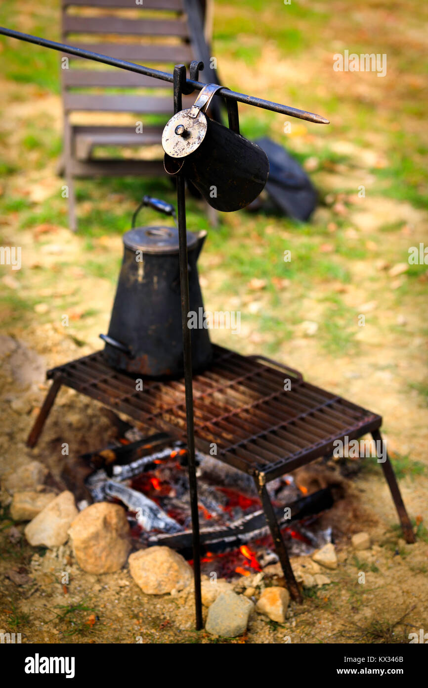 Ancient tea kettle on campfire Stock Photo Alamy