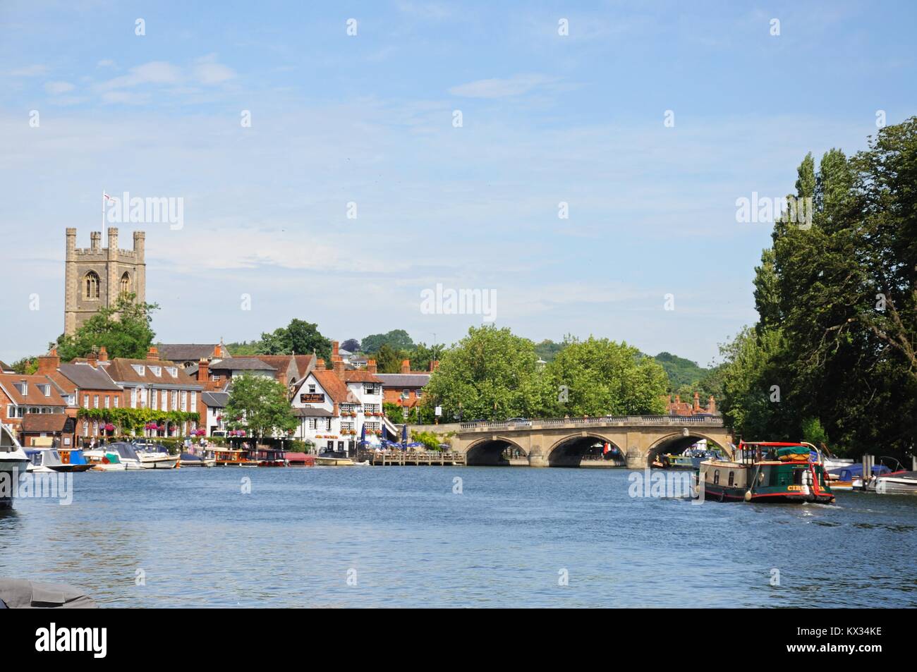 View along the River Thames towards the Parish Church of St Mary the Virgin, Henley-on-Thames, Oxfordshire, England, UK, Western Europe. Stock Photo