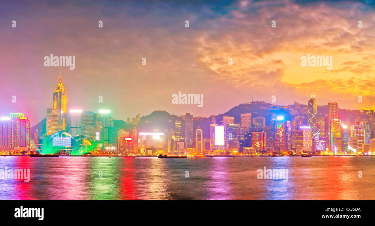 Victoria Harbor and Hong Kong skyline at dusk Stock Photo - Alamy