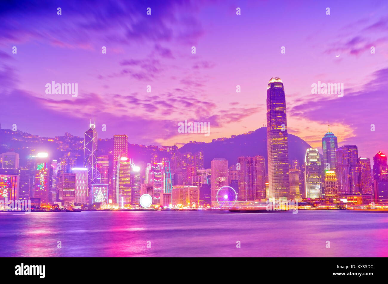 Victoria Harbor and Hong Kong skyline at dusk Stock Photo - Alamy