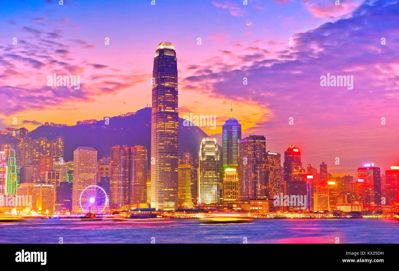 Victoria Harbor and Hong Kong skyline at dusk Stock Photo - Alamy