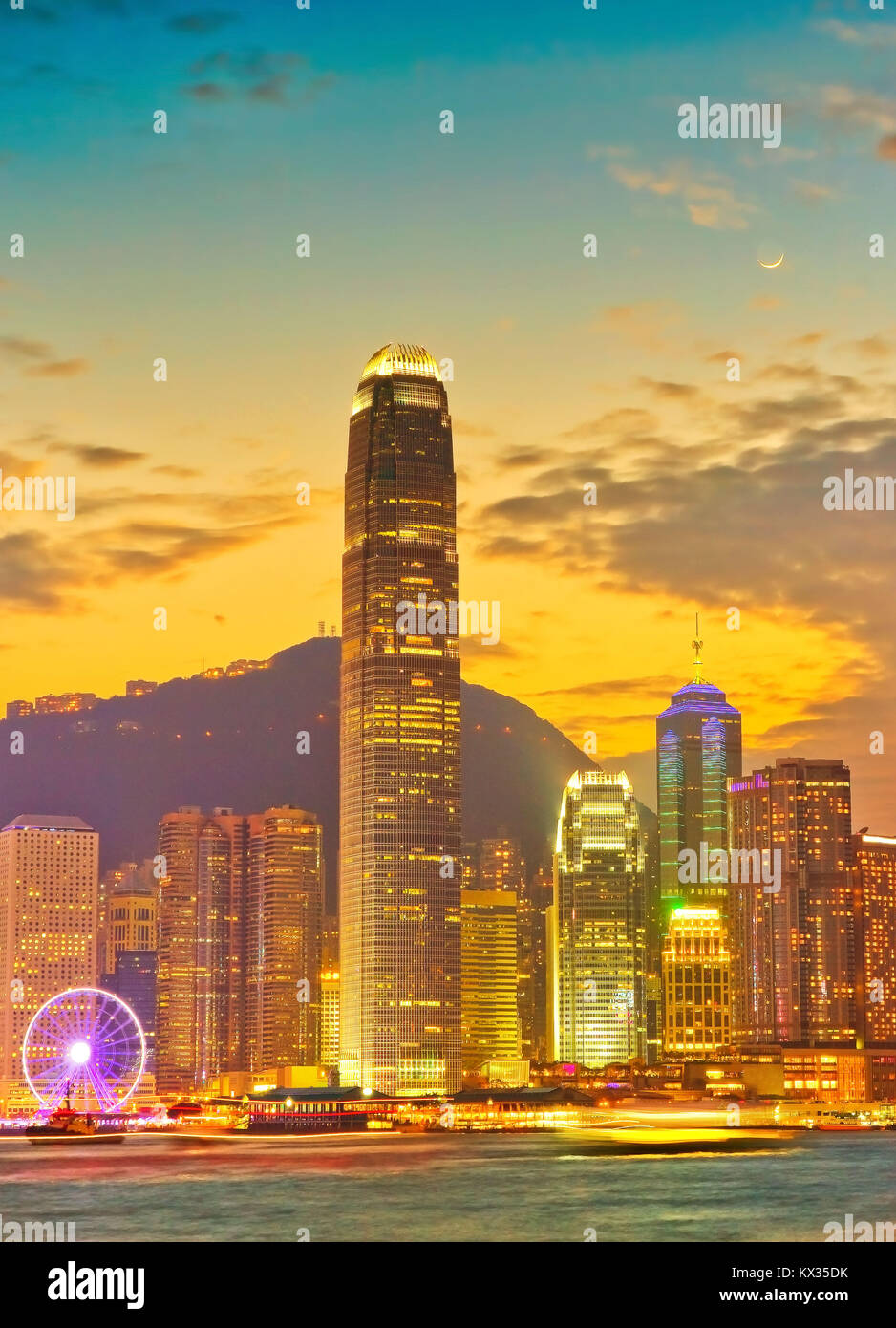 Victoria Harbor and Hong Kong skyline at dusk Stock Photo - Alamy