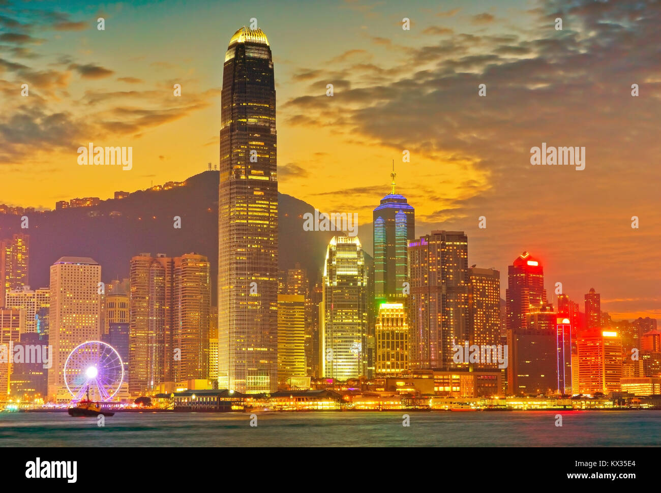 Victoria Harbor and Hong Kong skyline at dusk Stock Photo - Alamy