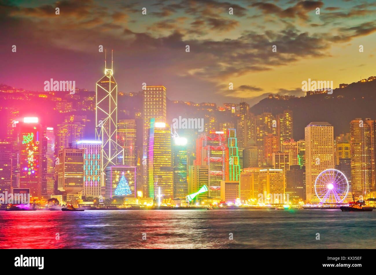 Victoria Harbor and Hong Kong skyline at dusk Stock Photo - Alamy