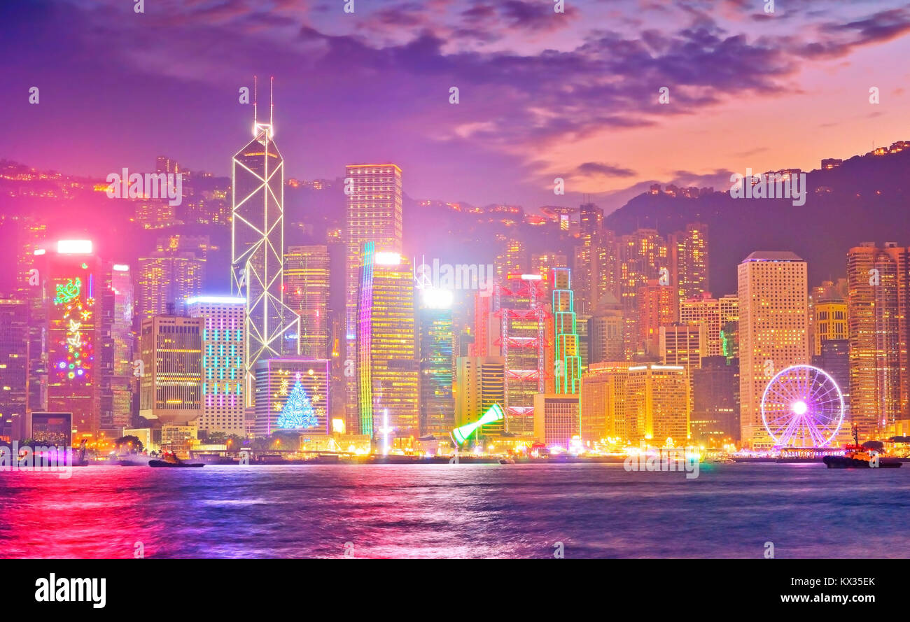 Victoria Harbor and Hong Kong skyline at dusk Stock Photo - Alamy