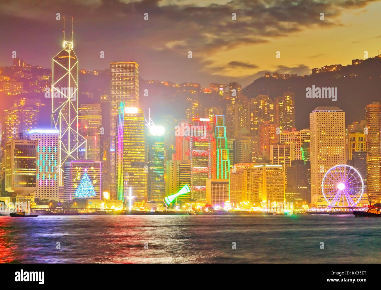 Victoria Harbor and Hong Kong skyline at dusk Stock Photo - Alamy