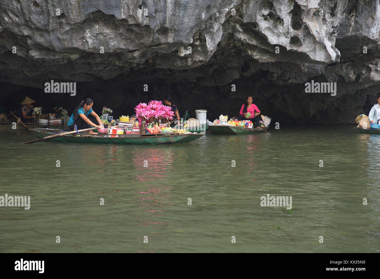 Selling goods o the Tam Coc river,Vietnam. Stock Photo