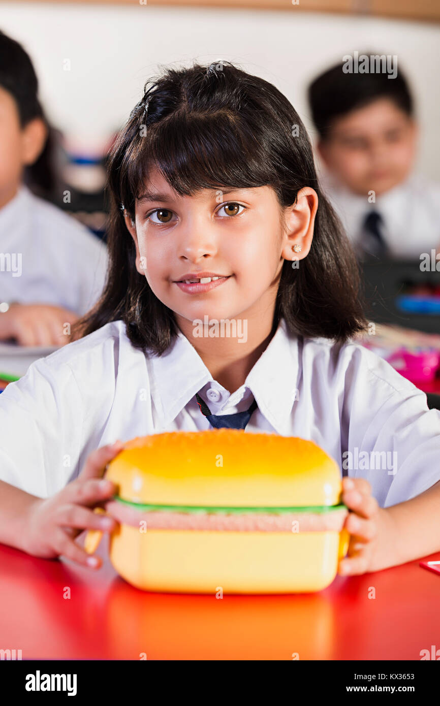 1 Indian School Girl Student Lunch Break Eating Lunch In Classroom