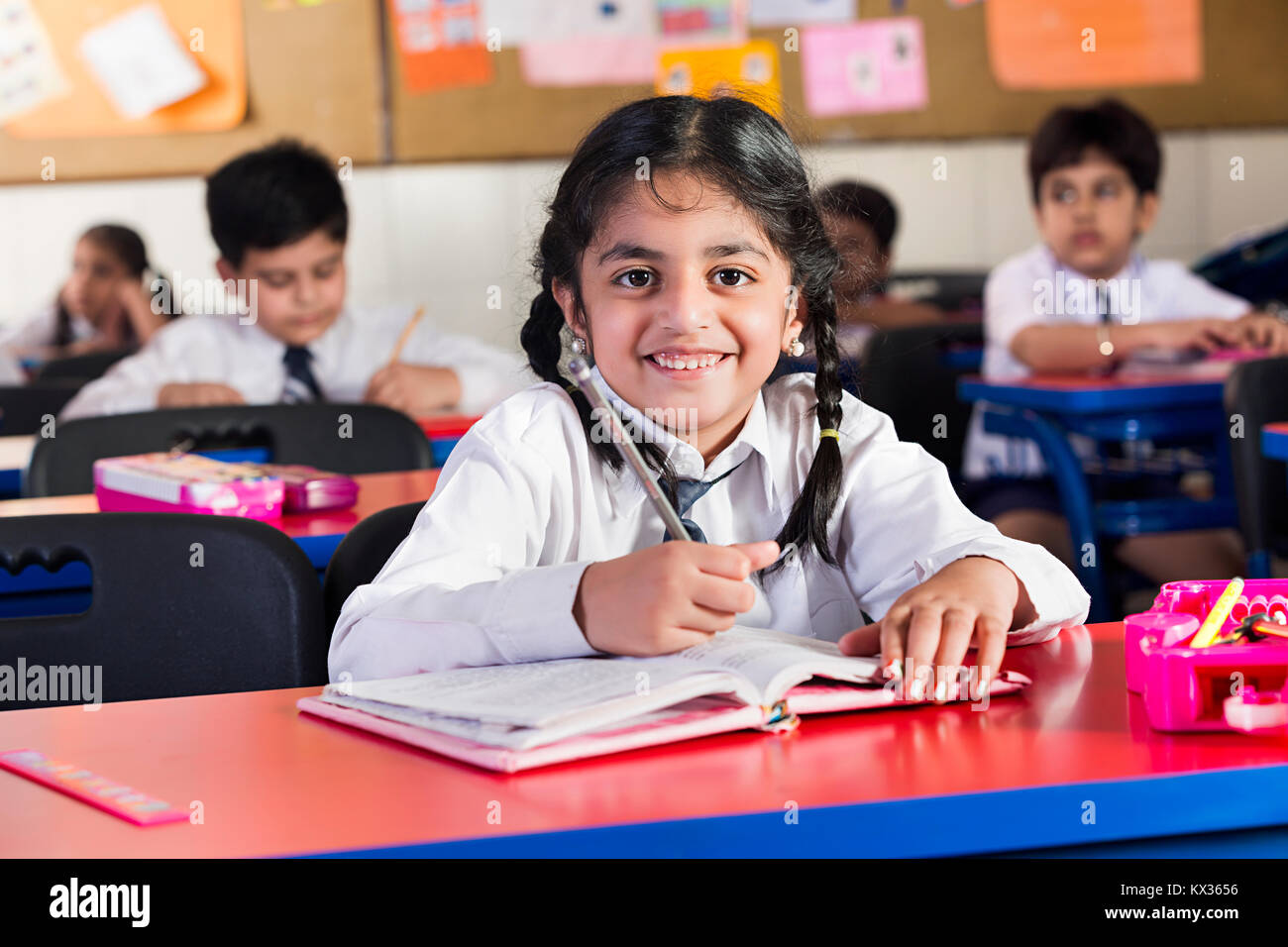 1 Indian School Kid Girl Notebook Writing Studying In Classroom Stock ...