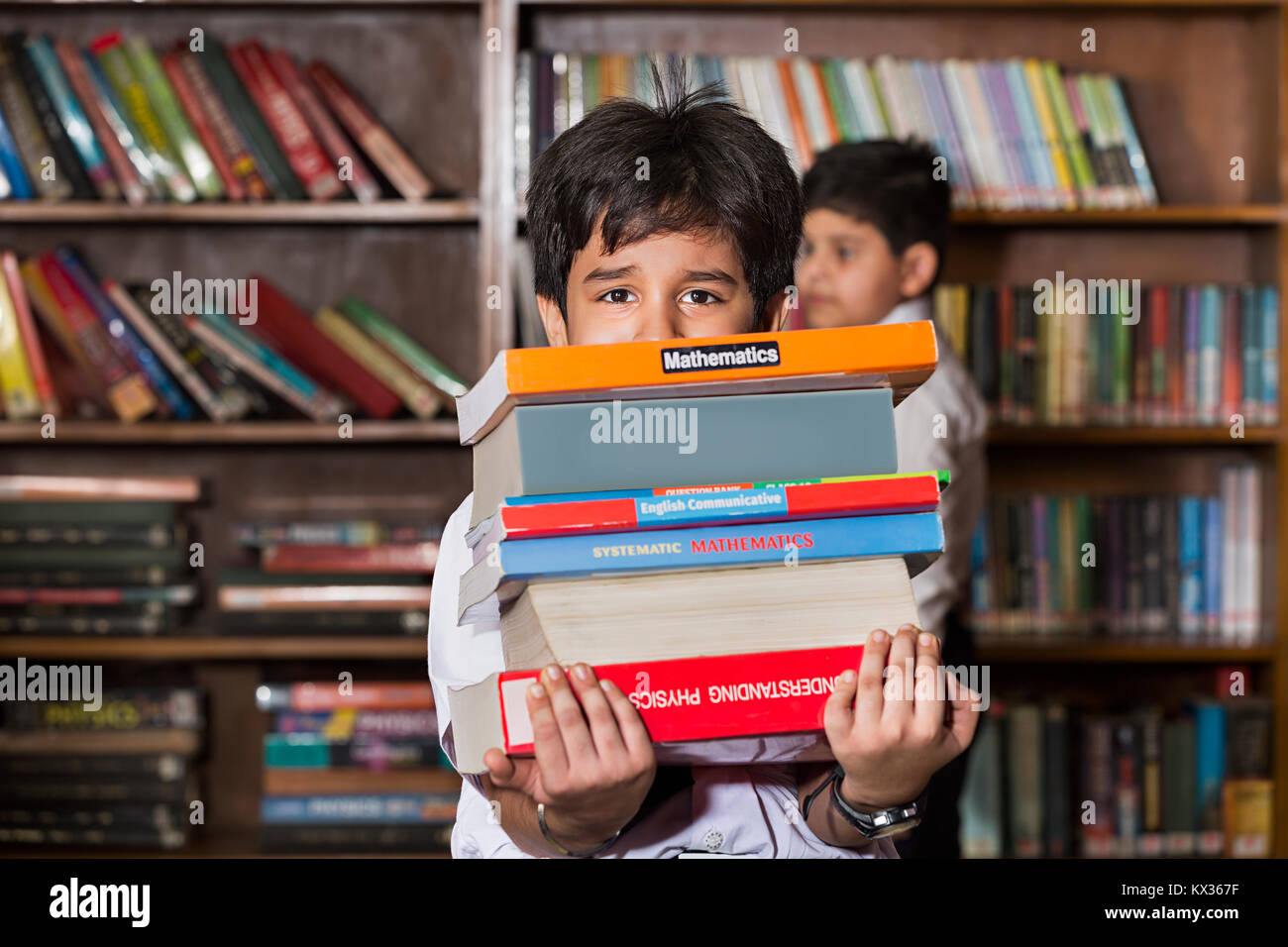 Burden 1 Indian School Little Boy Student Books Studying In Library Stock Photo