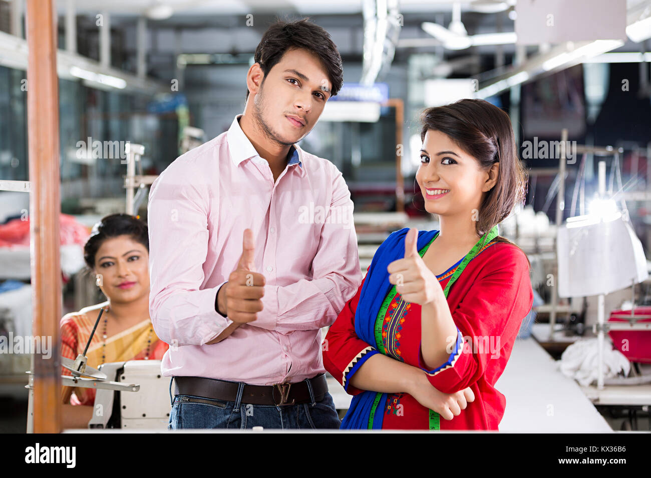 2 Workers Tailors Colleague Together In Sewing Workshop Stock Photo