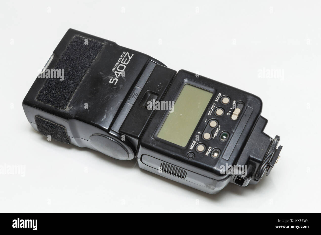 Canon speedlite flash gun, old, battered, scratched, tatty and heavily