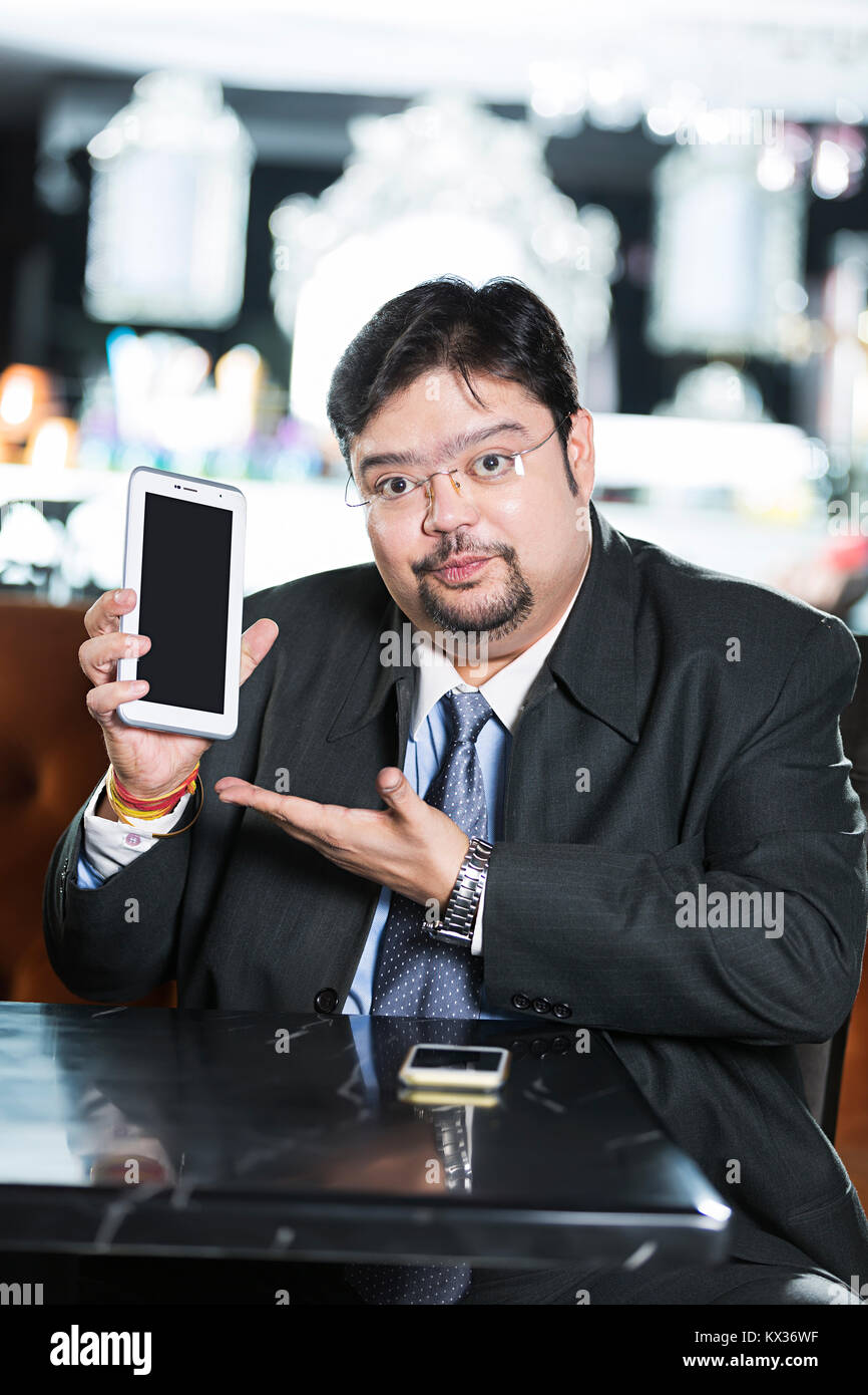 One Businessman Sitting Table Showing Mobile Tablet-PC Gesturing Hand In-Restaurant Stock Photo