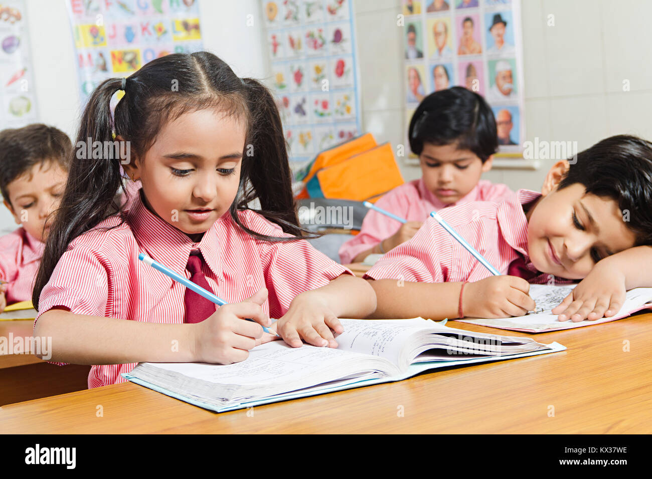 Indian School Children Students Book Study Education Learning in Classroom Stock Photo