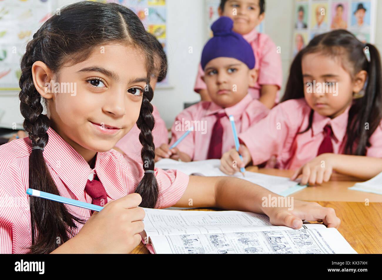 Indian School Childrens Students Notebook Writing Study In Class Stock Photo
