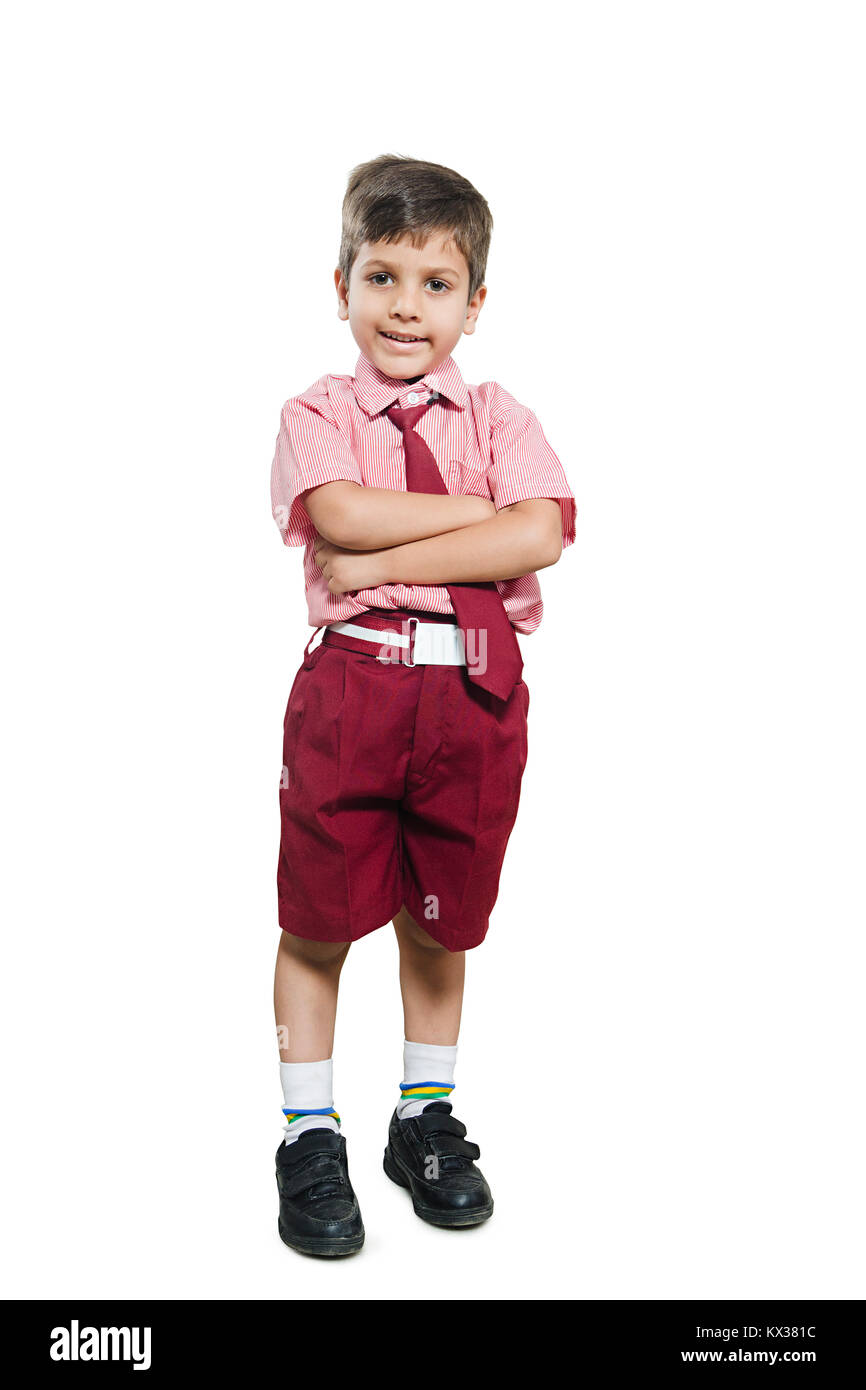 1 Indian School Boy Student Arms Crossed Standing White background Stock Photo