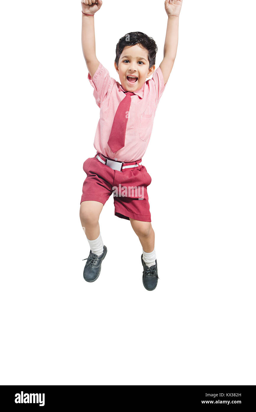 1 Indian School kid Boy Jumping Cheerful Successful Celebrating Stock Photo