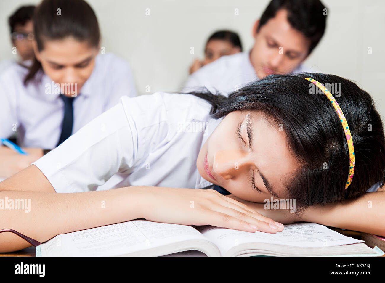 1 Indian School Teenager Girl Student Sleeping In Class Careless Stock Photo