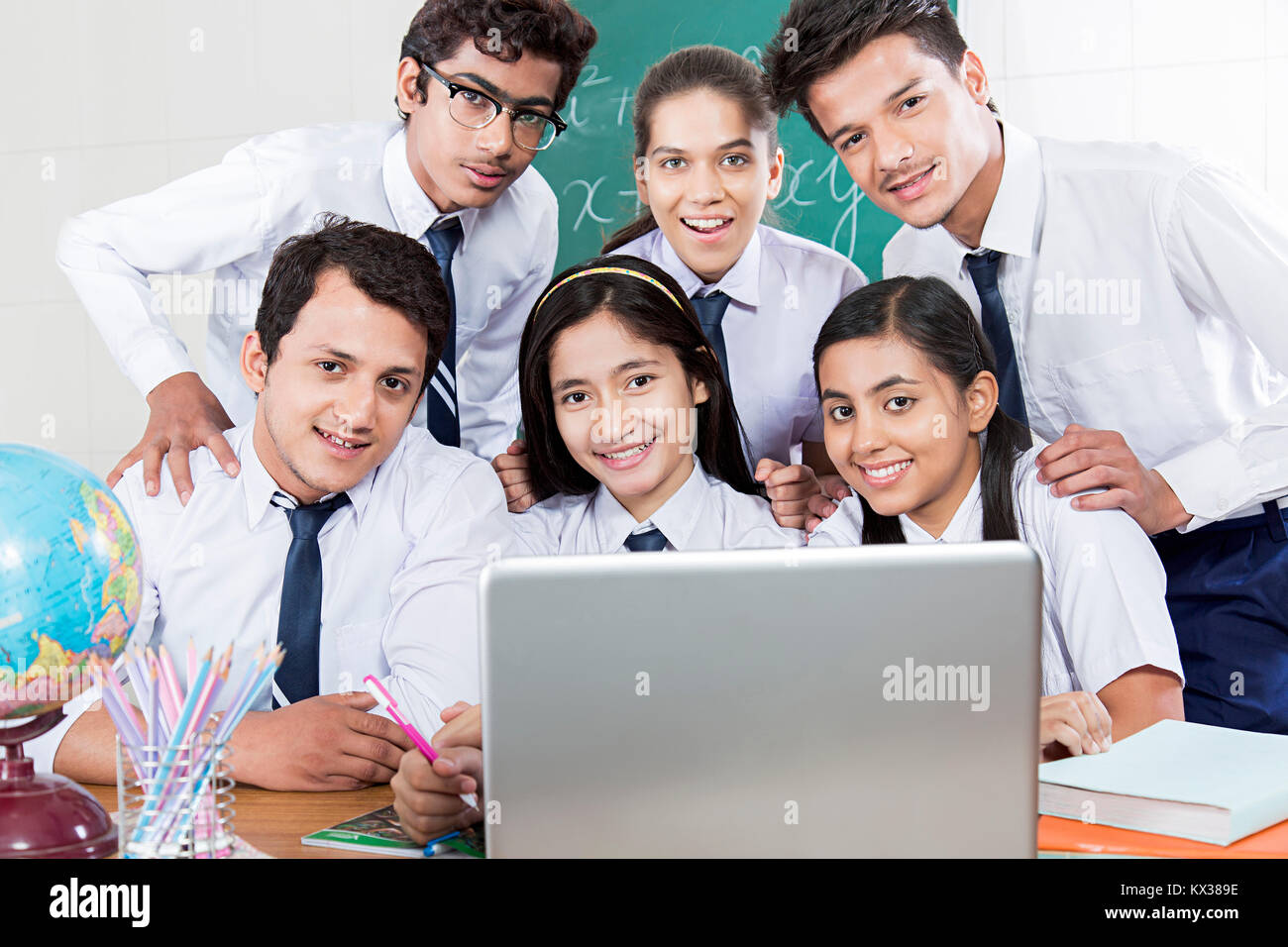 Indian School Young Students Using Laptop Studying Educaton Learning Class Stock Photo