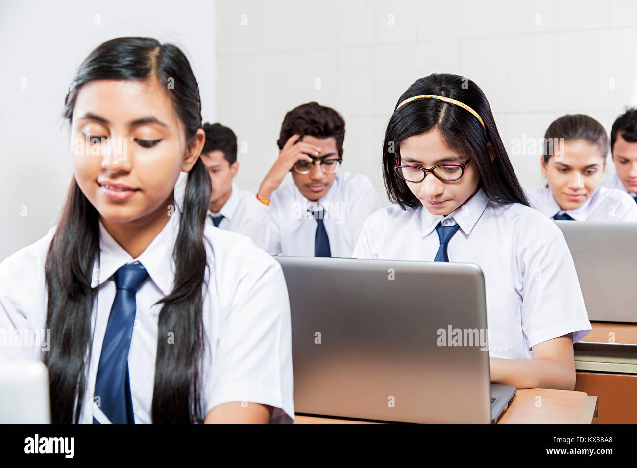 Indian Group School Students Classmate Using Laptop Study Education Classroom Stock Photo