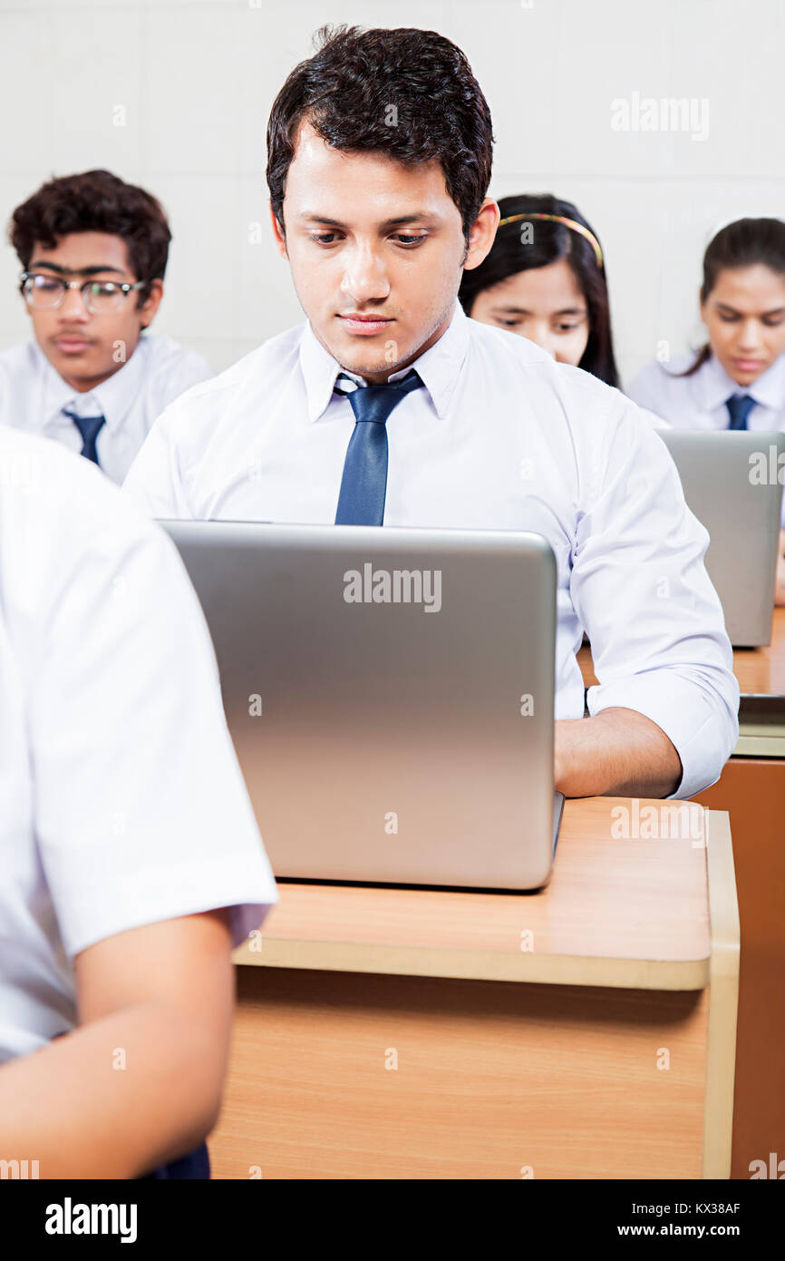 Indian High School Students Boy Laptop Study Education learning Class Stock Photo