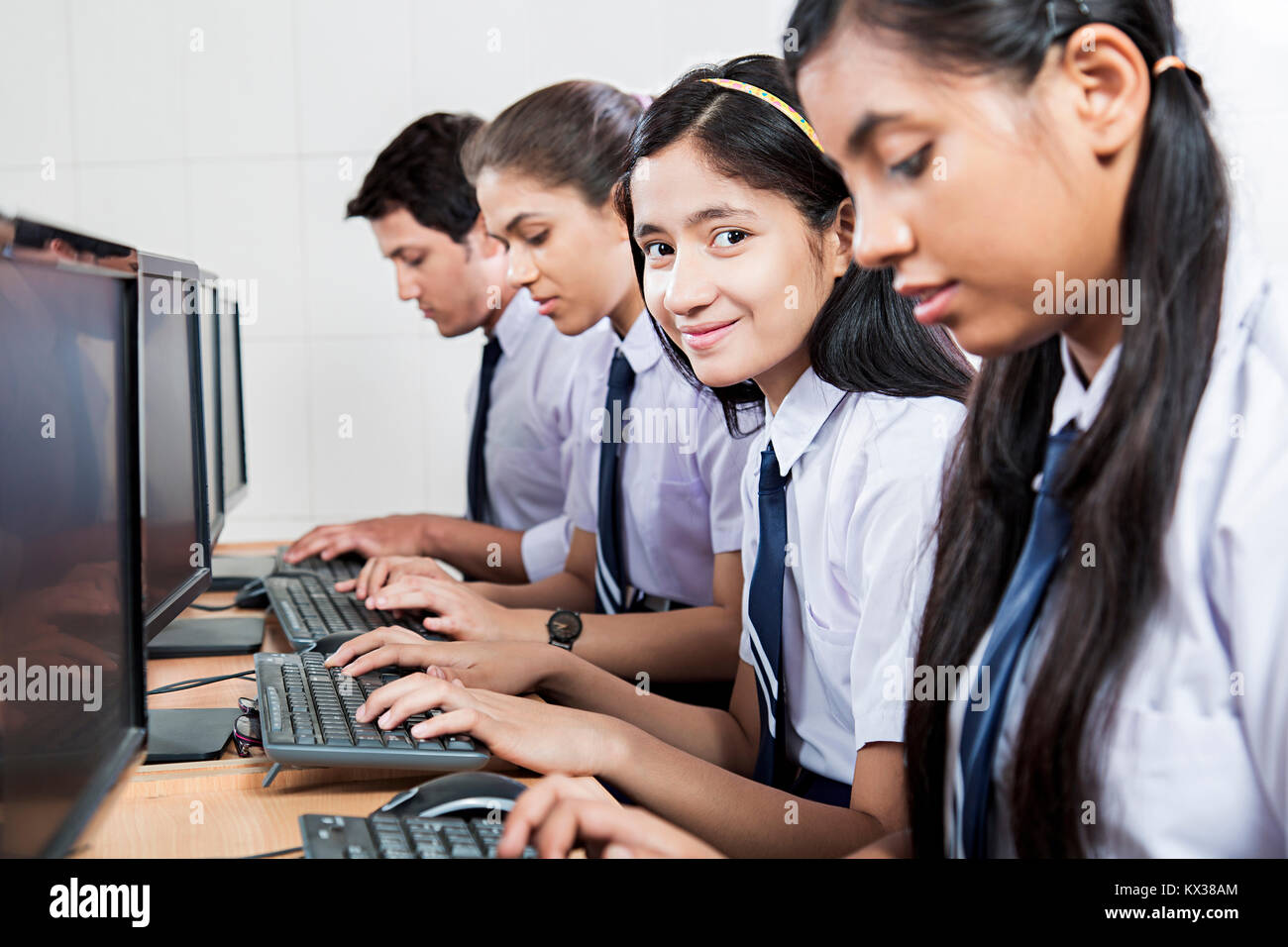 Indian School Students Girl Using Computer Studying Education Learning Class Stock Photo