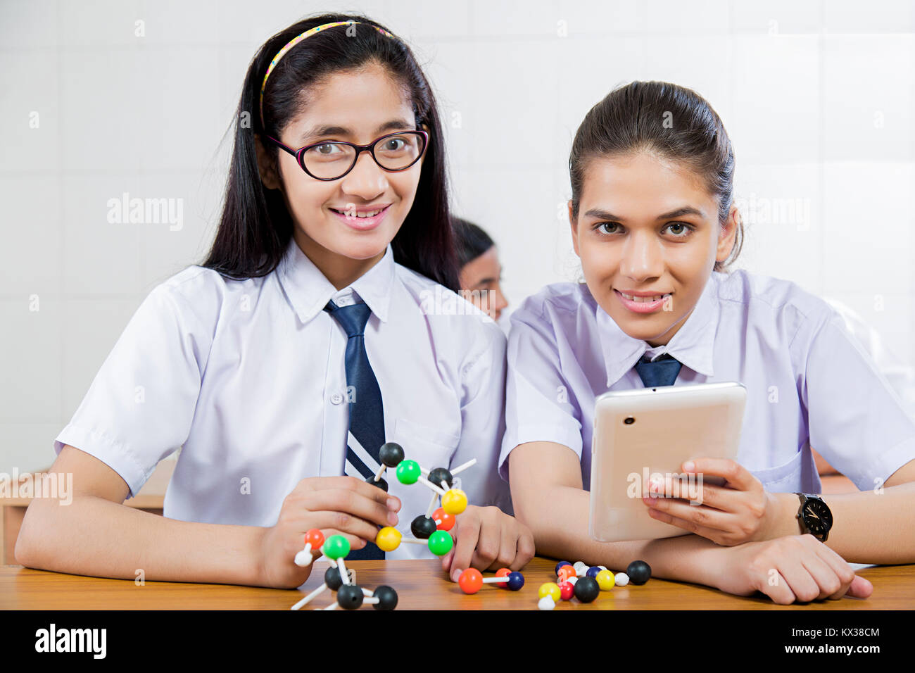 2 School Teenagers Girls Students Molecule With Tablet Phone Studying Stock Photo