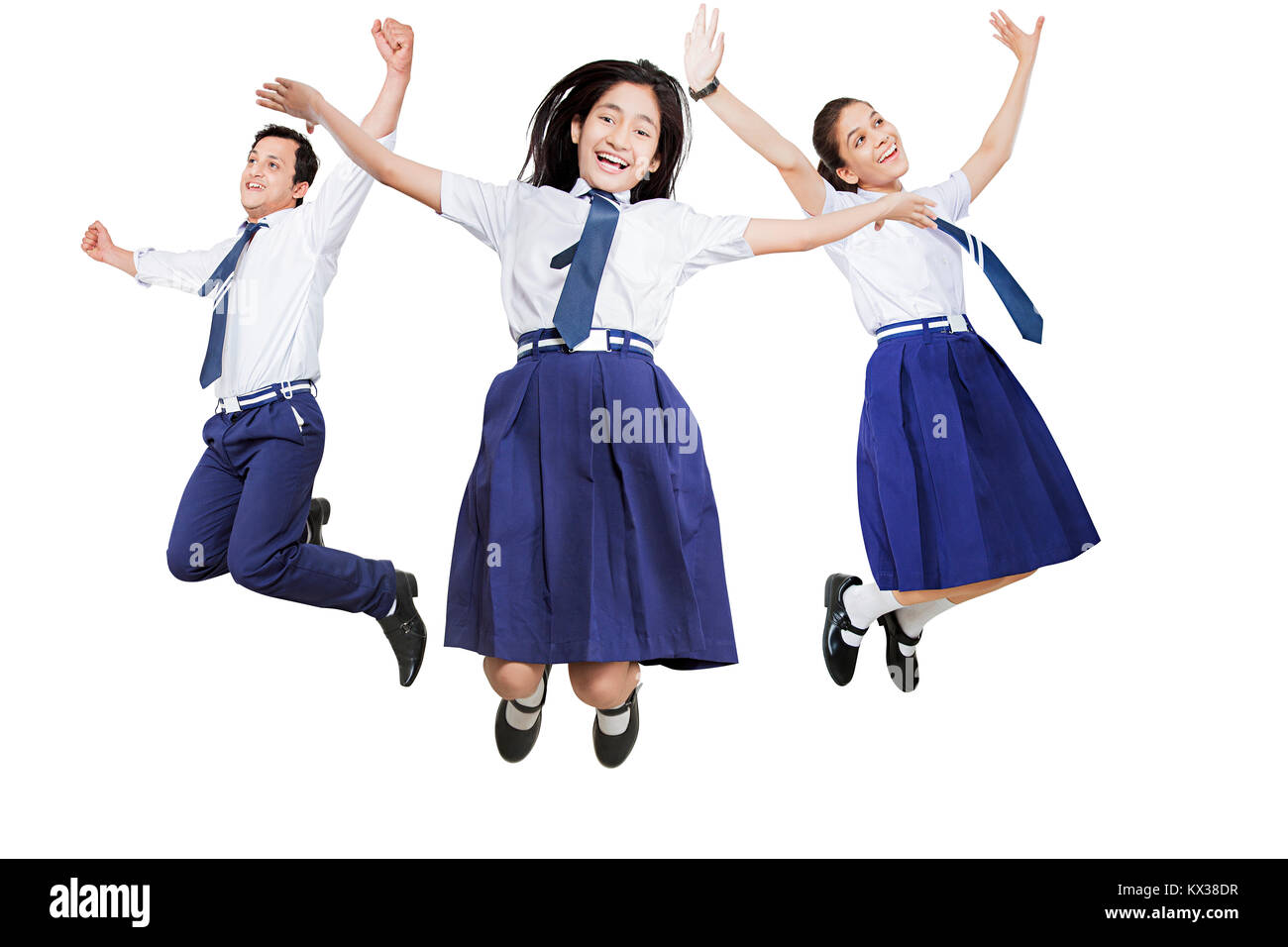 3 Indian Young School Students Friends Jumping Fun Cheerful Excitement Stock Photo