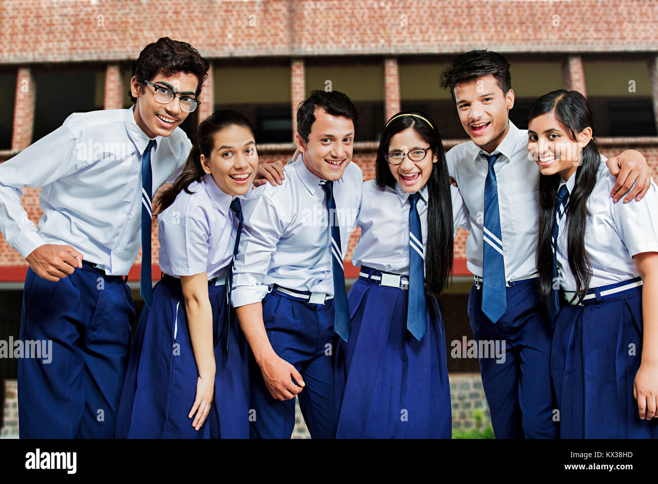 Indian Group High School Students Friends Standing Together Campus Enjoying Stock Photo
