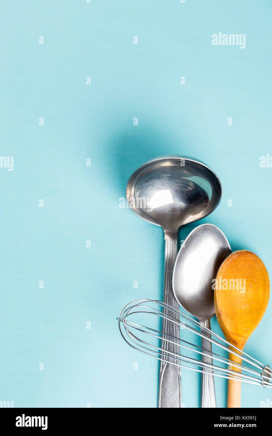 Used home kitchenware with scratches on paper background Stock Photo