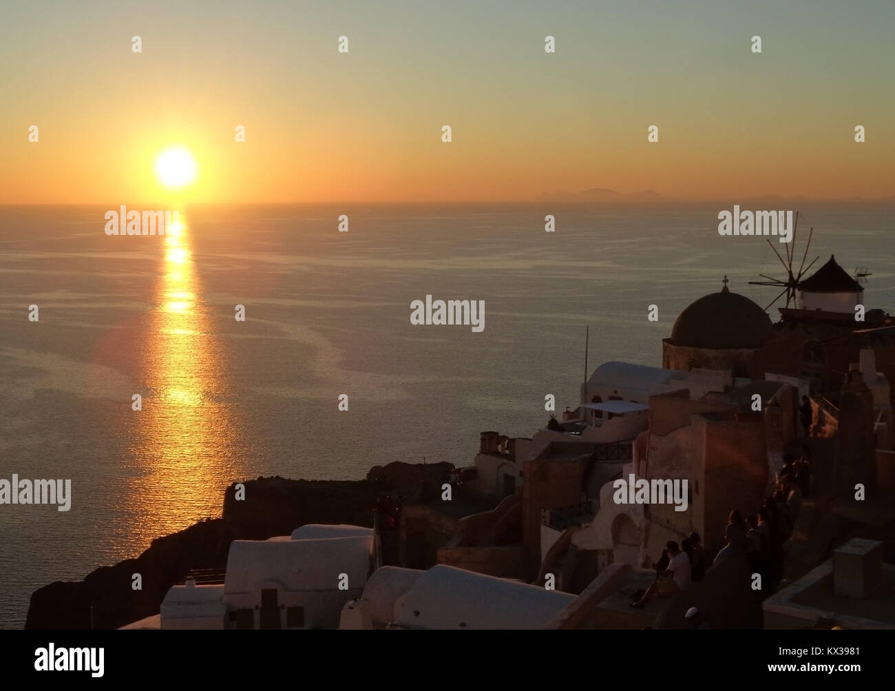 Breathtaking Sunset at Oia Village, Santorini Island of Greece Stock Photo