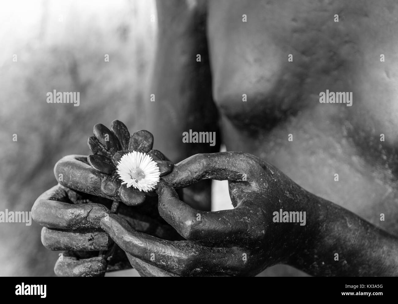 Bronze statue detail of human hands. Image in Black and white Stock Photo