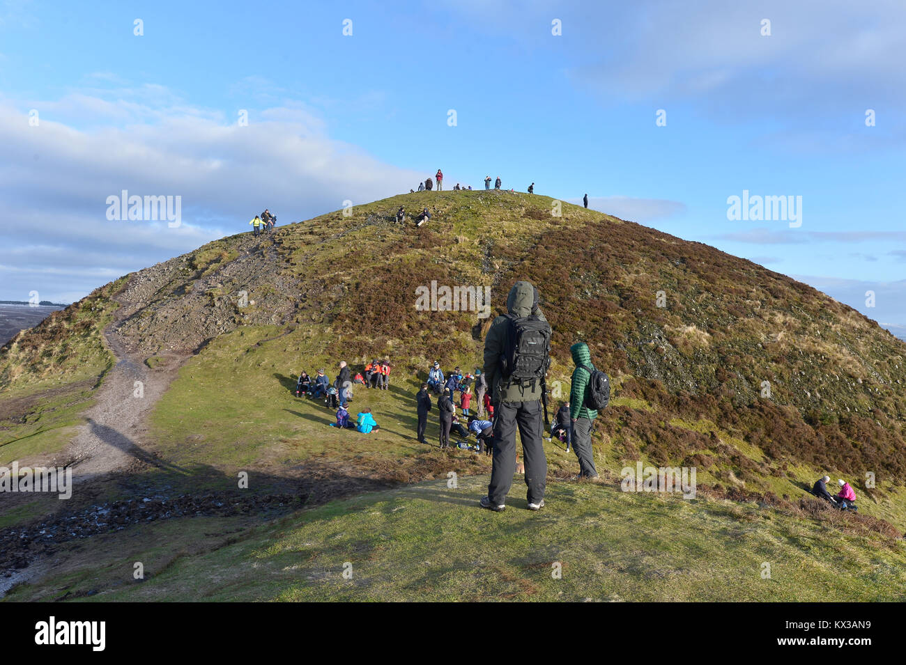 Walkers on Conic Hill summit above Balmaha, Loch Lomond. Stock Photo