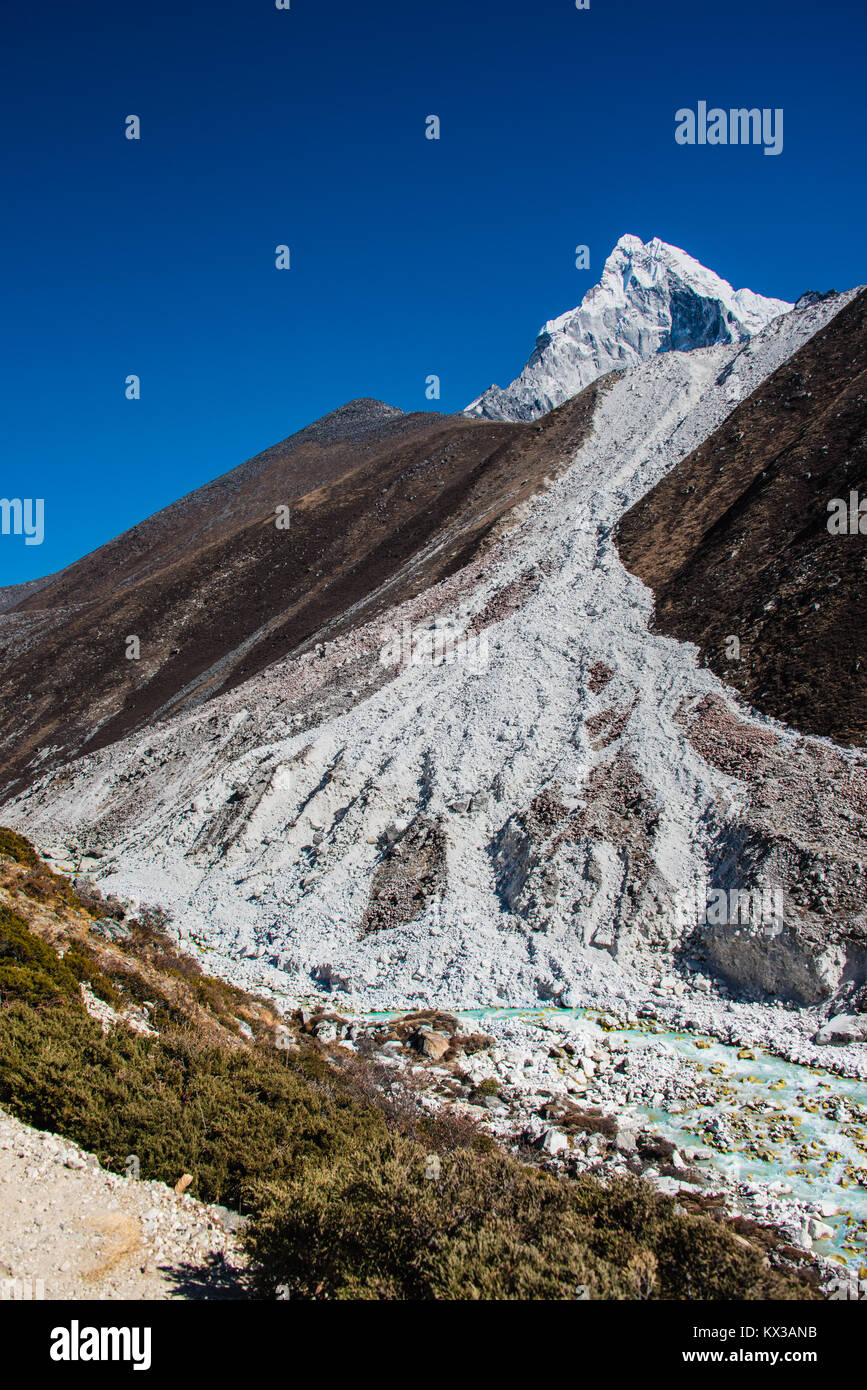 icy landslide in the mountains at high altitude near Everest Base Camp, Nepal Stock Photo