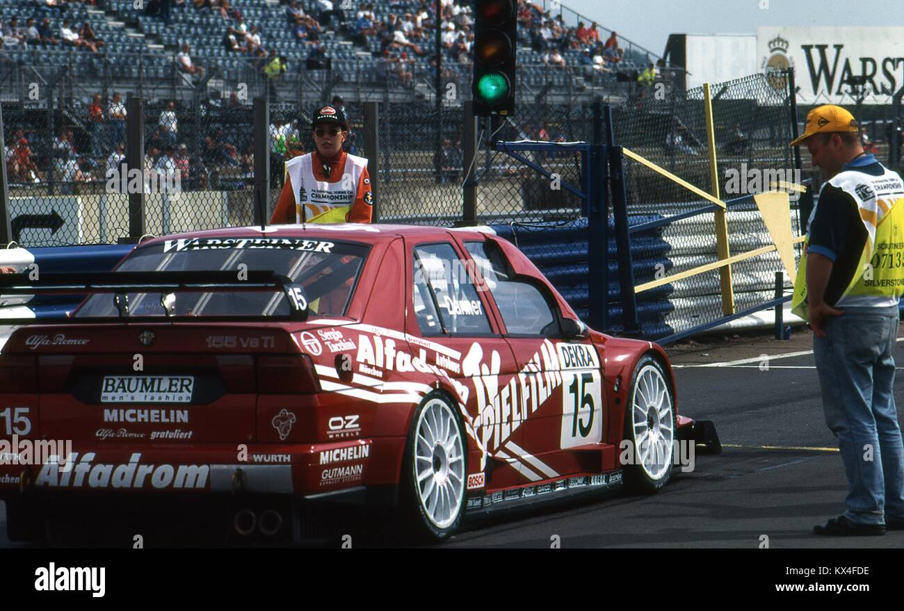 Christian Danner waiting to leave the pits in his TV Spielfilm Alfa Corse Alfa Romeo 155 V6 TI, International Touring Car Championship, Silverstone Aug 17th 1996 Stock Photo