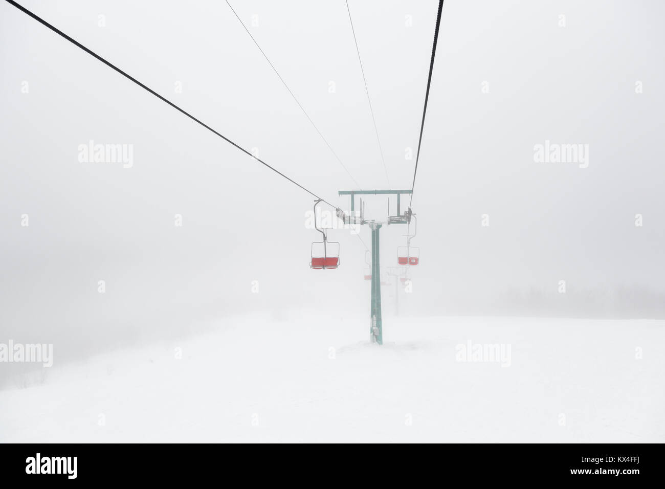 Skilift in fog Stock Photo Alamy