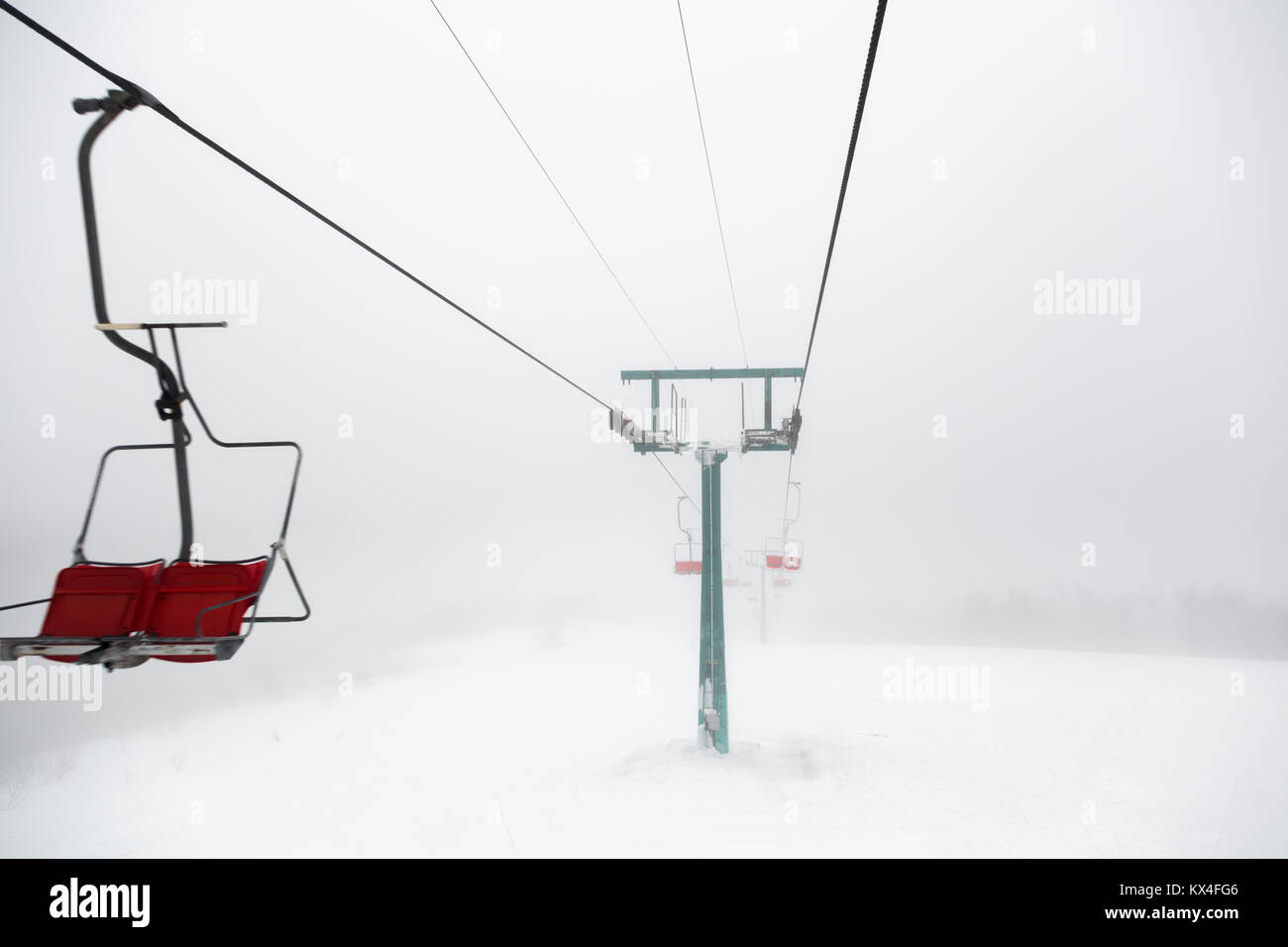 Ski-lift in fog Stock Photo