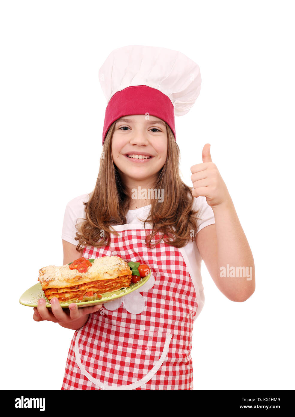 happy little girl cook with Italian lasagne and thumb up Stock Photo