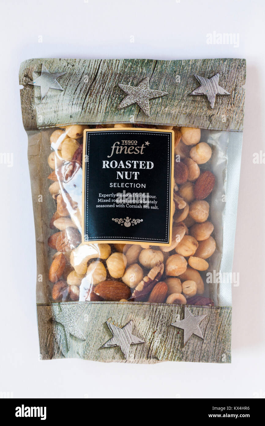 Packet of Tesco finest roasted nut selection isolated on white