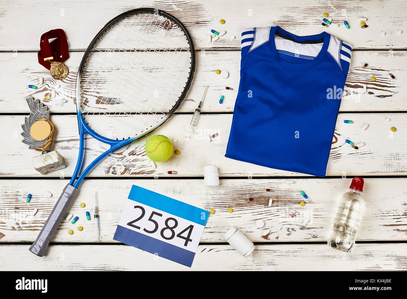 Tennis equipment, drugs and awards Stock Photo
