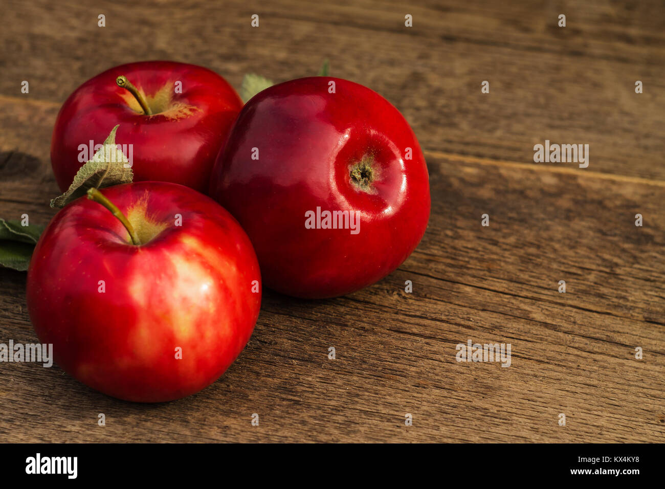 apple on a blurred background of apples on a table Stock Photo Alamy