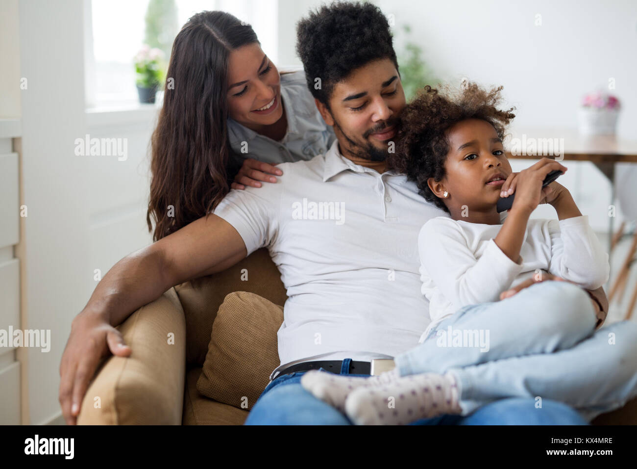Young family being playful at home Stock Photo