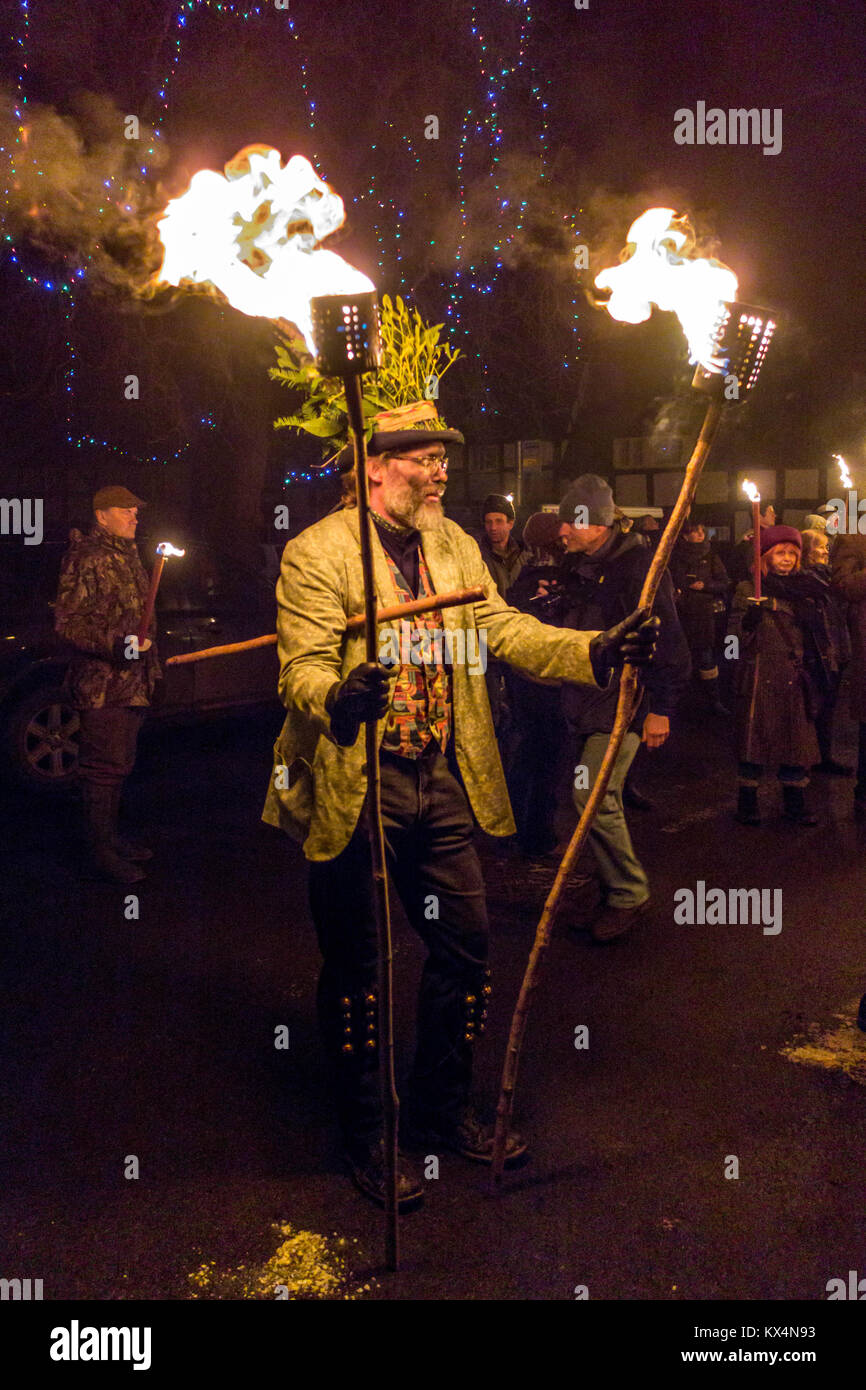Dilwyn, Herefordshire, UK. 6th Jan, 2018. Members of the Leominster Morris gather with crowds at the Crown Inn before heading to the apple orchard of Mr Richard Wellings to take part in a torchlit Cider wassailing ceremony ahead of Twelfth Night. Credit: ZUMA Press, Inc./Alamy Live News Stock Photo