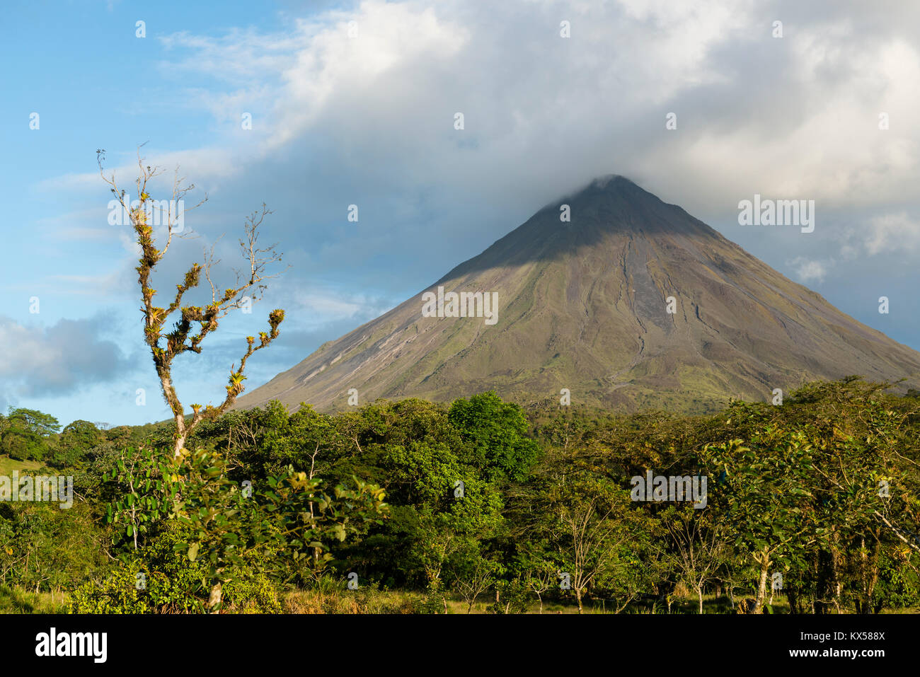 Volcano Arenal in clouds, Arenal Volcano National Park, Alajuela province, Costa Rica Stock Photo