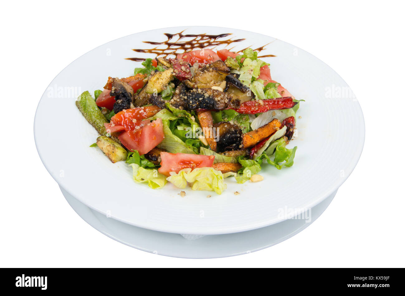 Salad. Vegetables baked on barbecue. On a white background. Stock Photo
